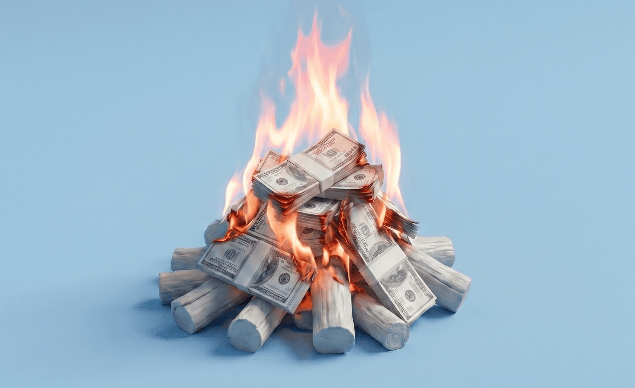 Stack of money on fire